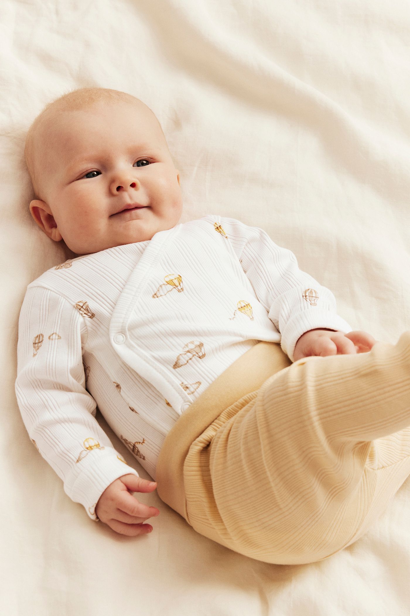 Ribbed bodysuit with hot air balloon motif | Off-white | Baby | Newbie