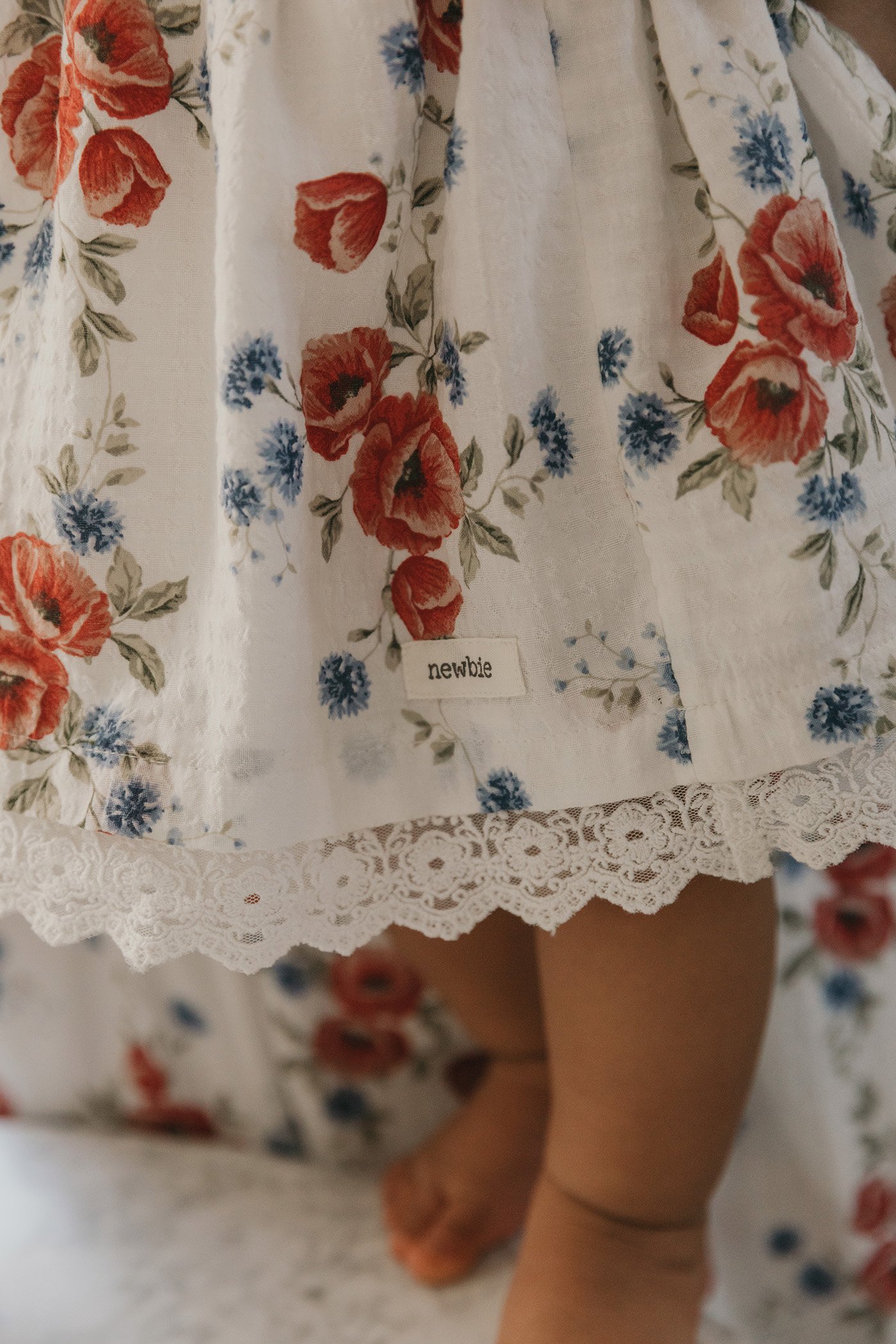 Close-up on red floral dress