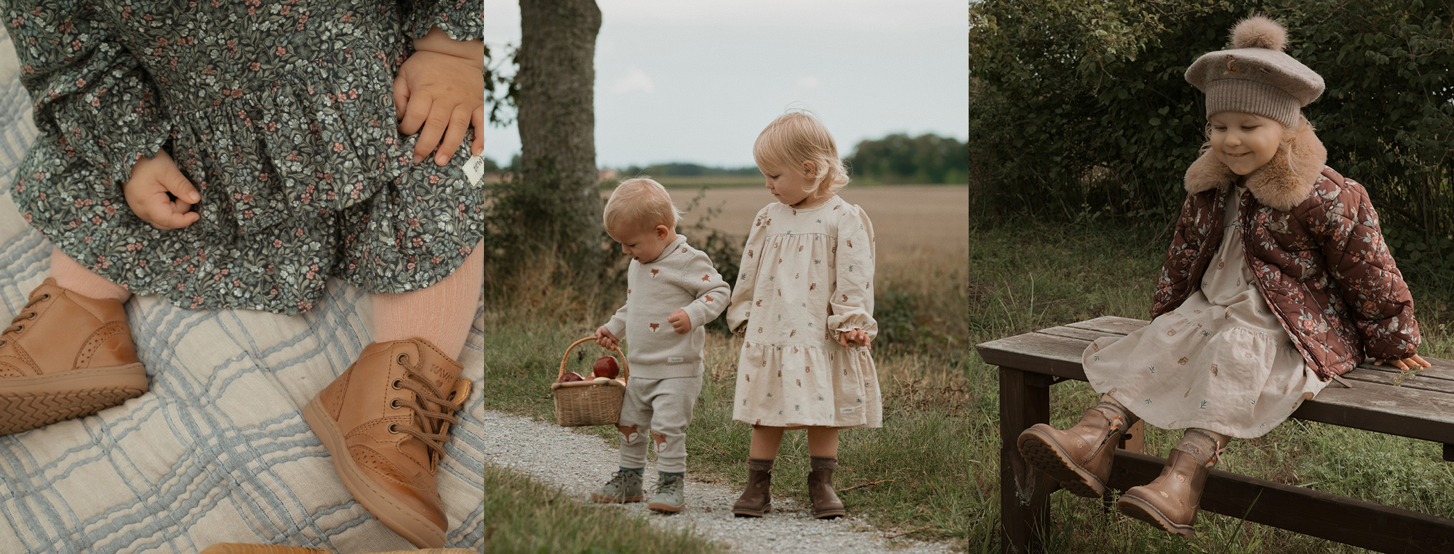 Child in a cream woodland-print dress beside a child in a fox-pattern knitted set carrying a wicker basket with apples.