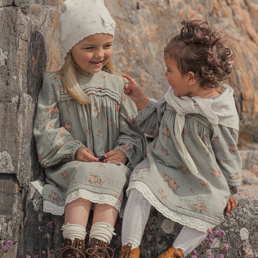 Sisters in matching outfits