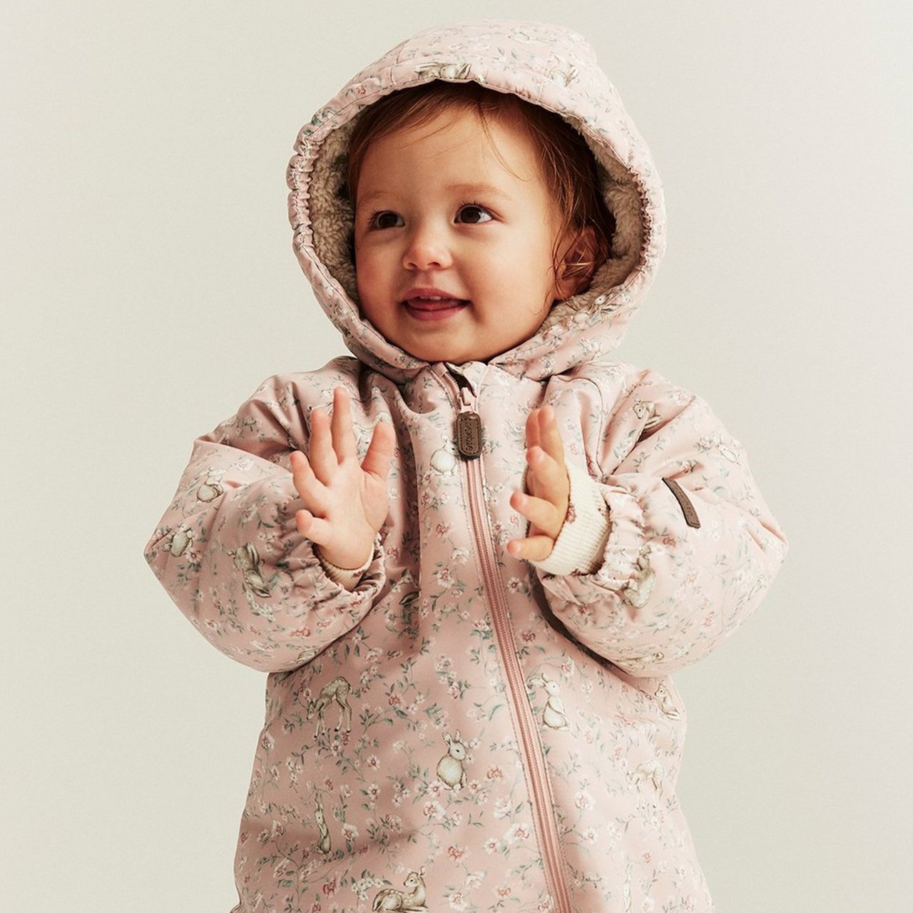 Pink overall with flower details