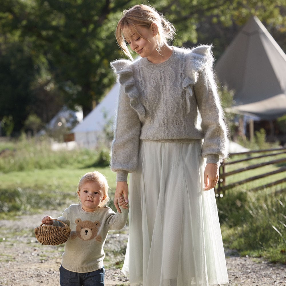 Woman with son in matching outfits