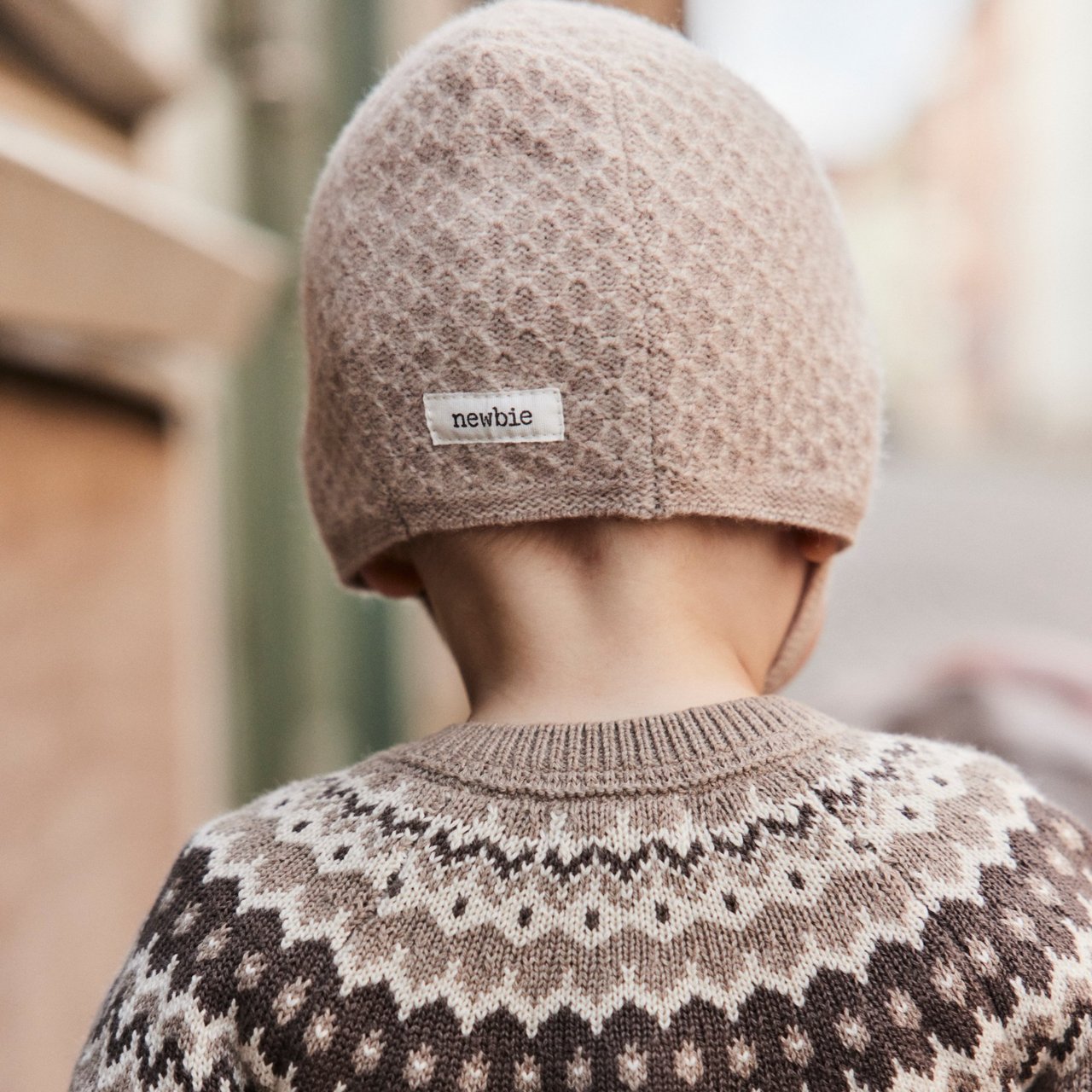 Boy wearing a knitted beanie