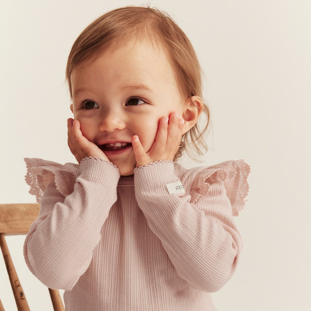 Baby girl in pink clohtes