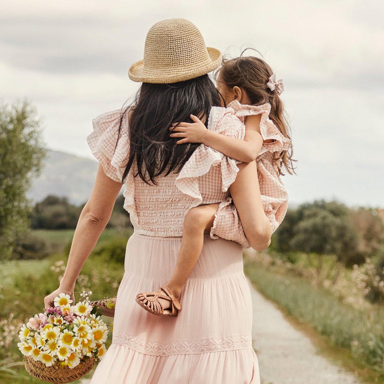 Woman with daughter in matching dresses