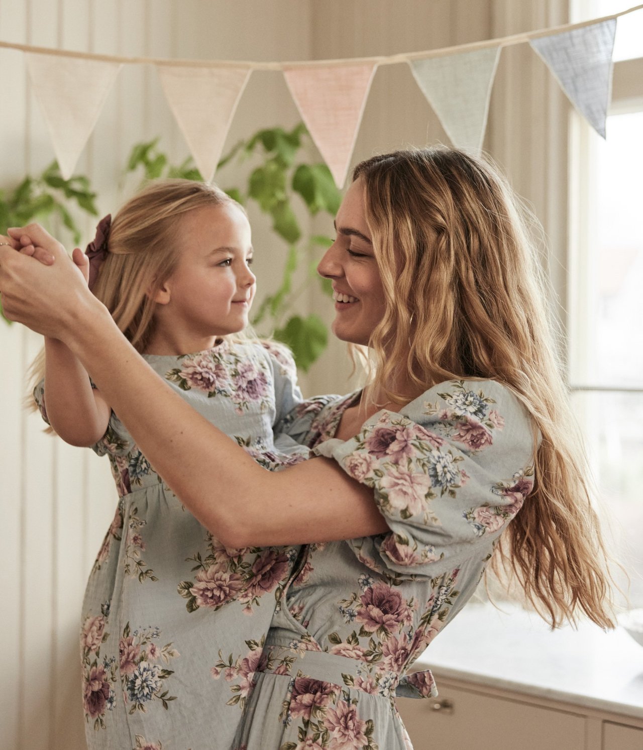 Woman with son in matching outfits