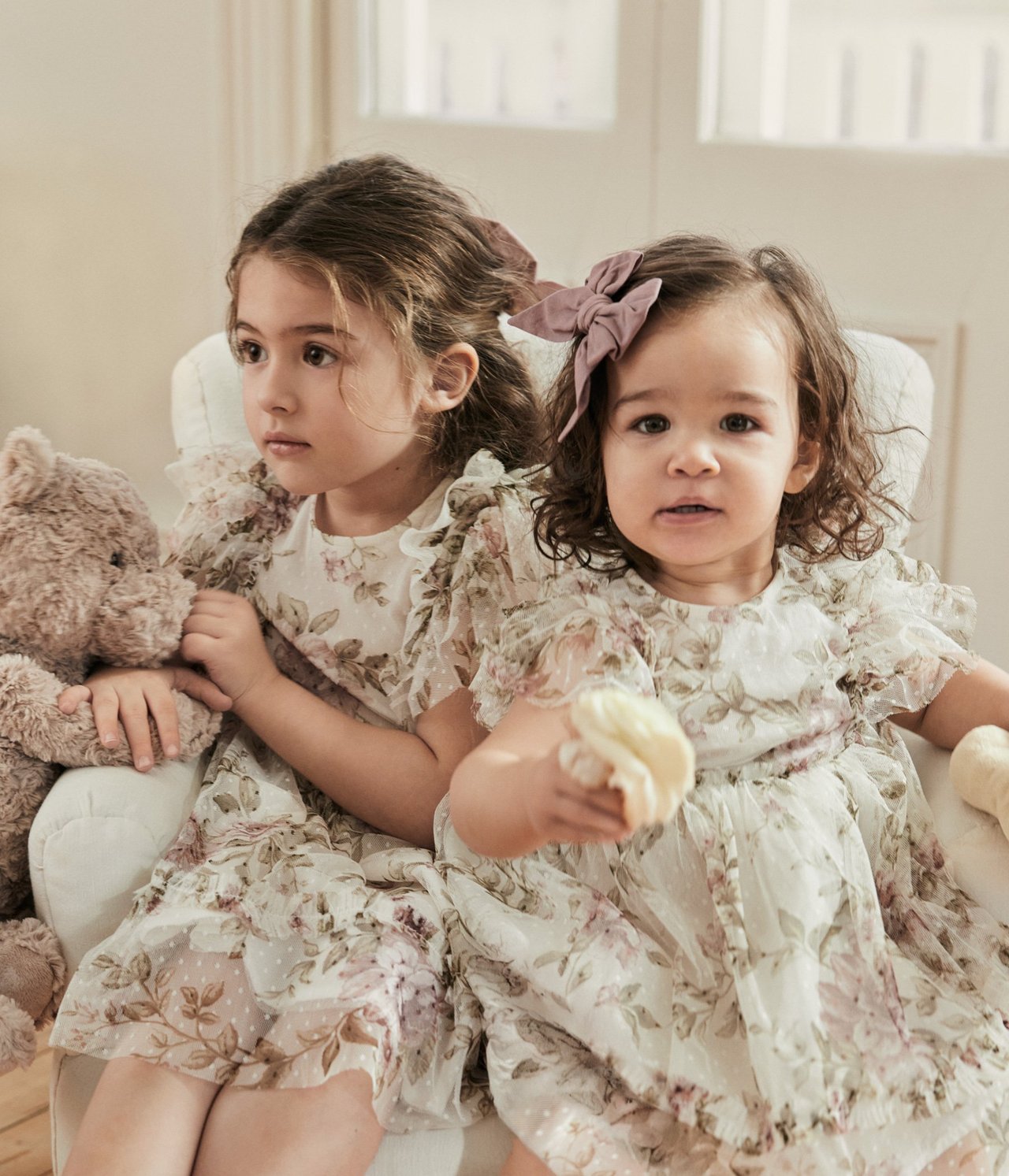 Sisters in floral dresses