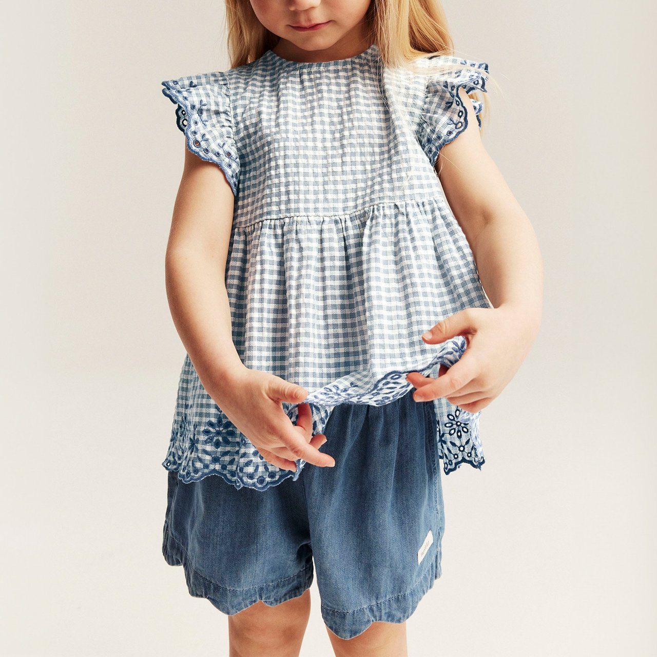 Girl in denim shorts