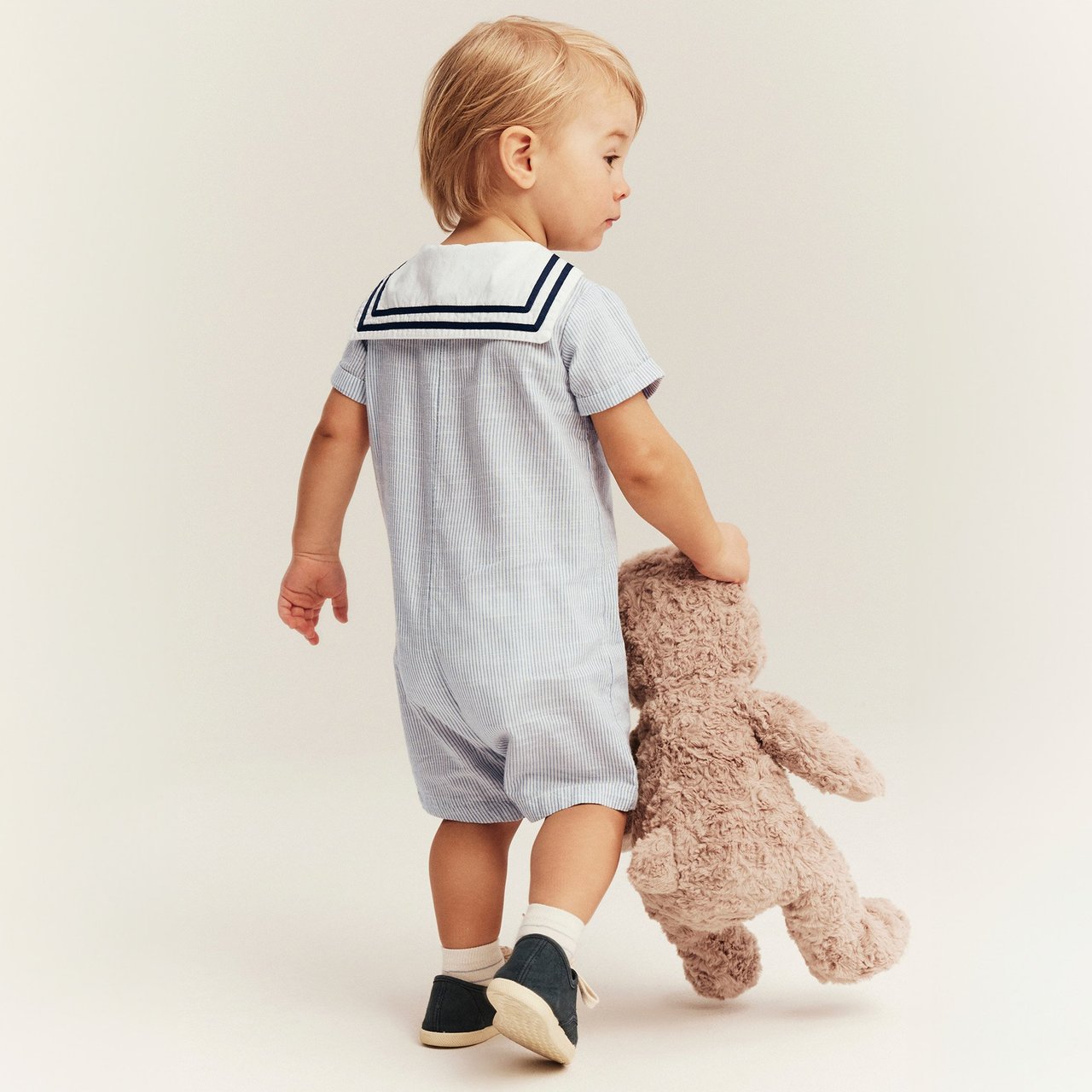 Boy in sailor jumpsuit