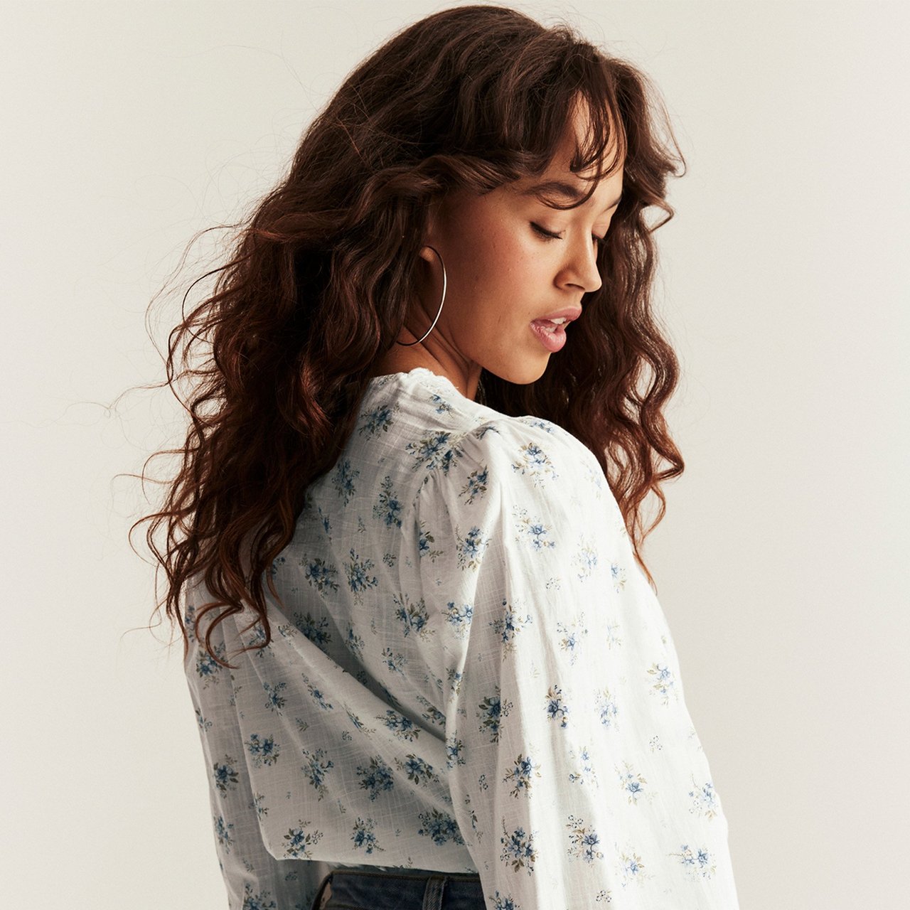 Woman wearing a blue cardigan