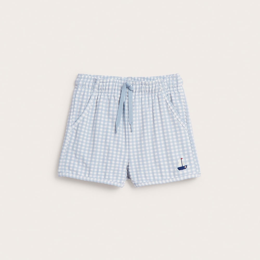 Blue swim shorts with blue, checked pattern