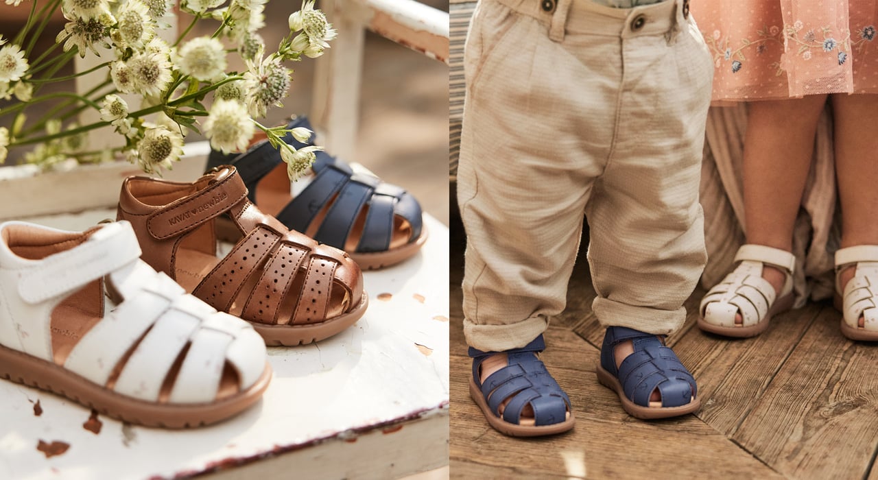 Pre-walker shoes with flowers in them