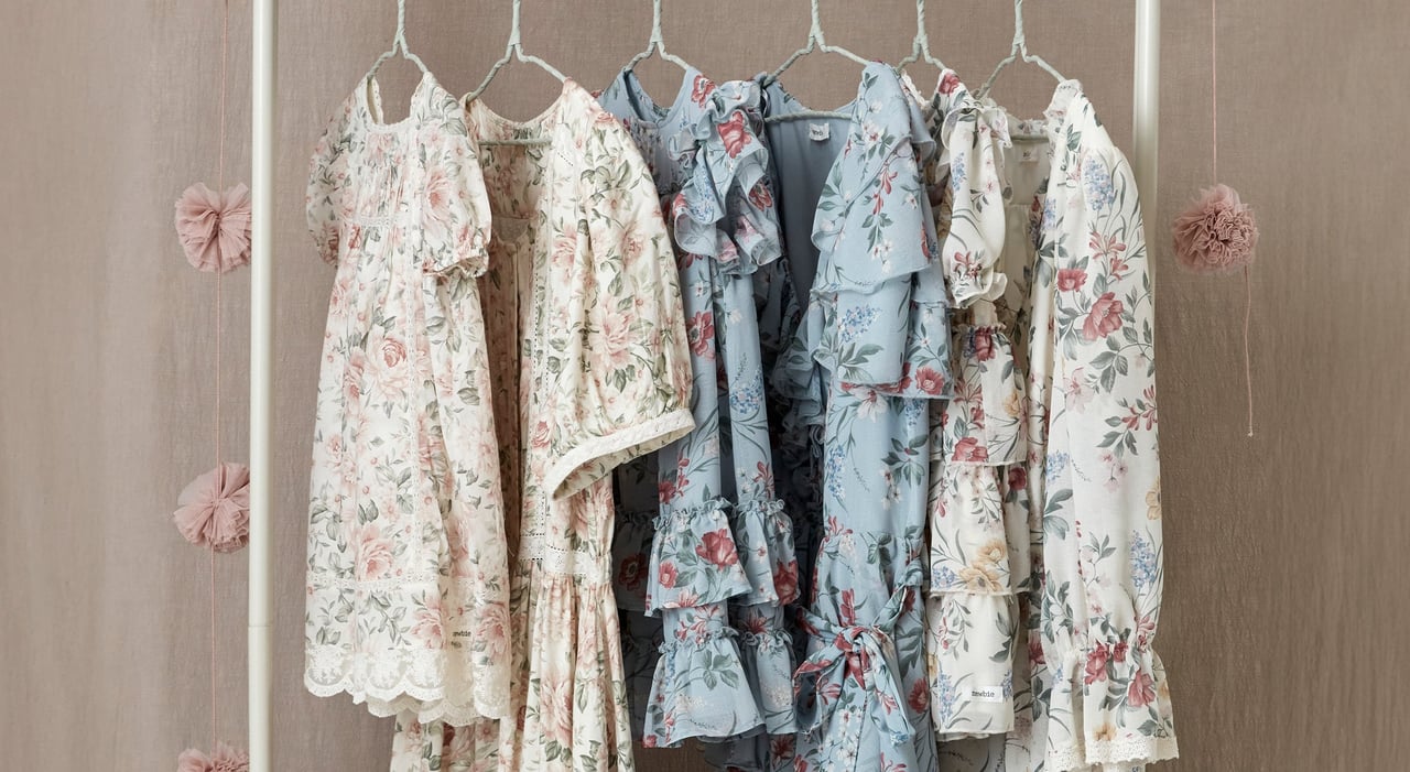 Kids having a tea party wearing cute occasionwear