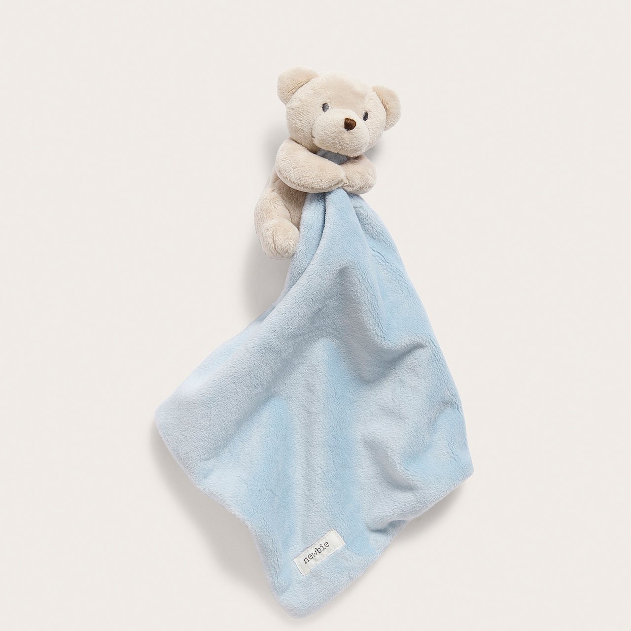 Blaue Kuscheldecke mit Teddybär