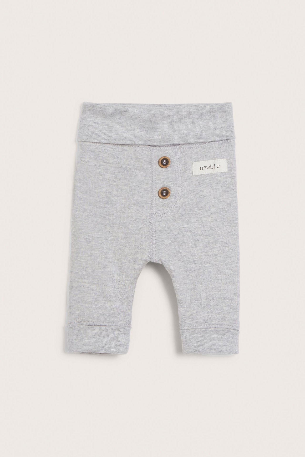 Front view: Melange grey baby cotton leggings with fold-down waist, fold-up cuffs, and two decorative buttons.