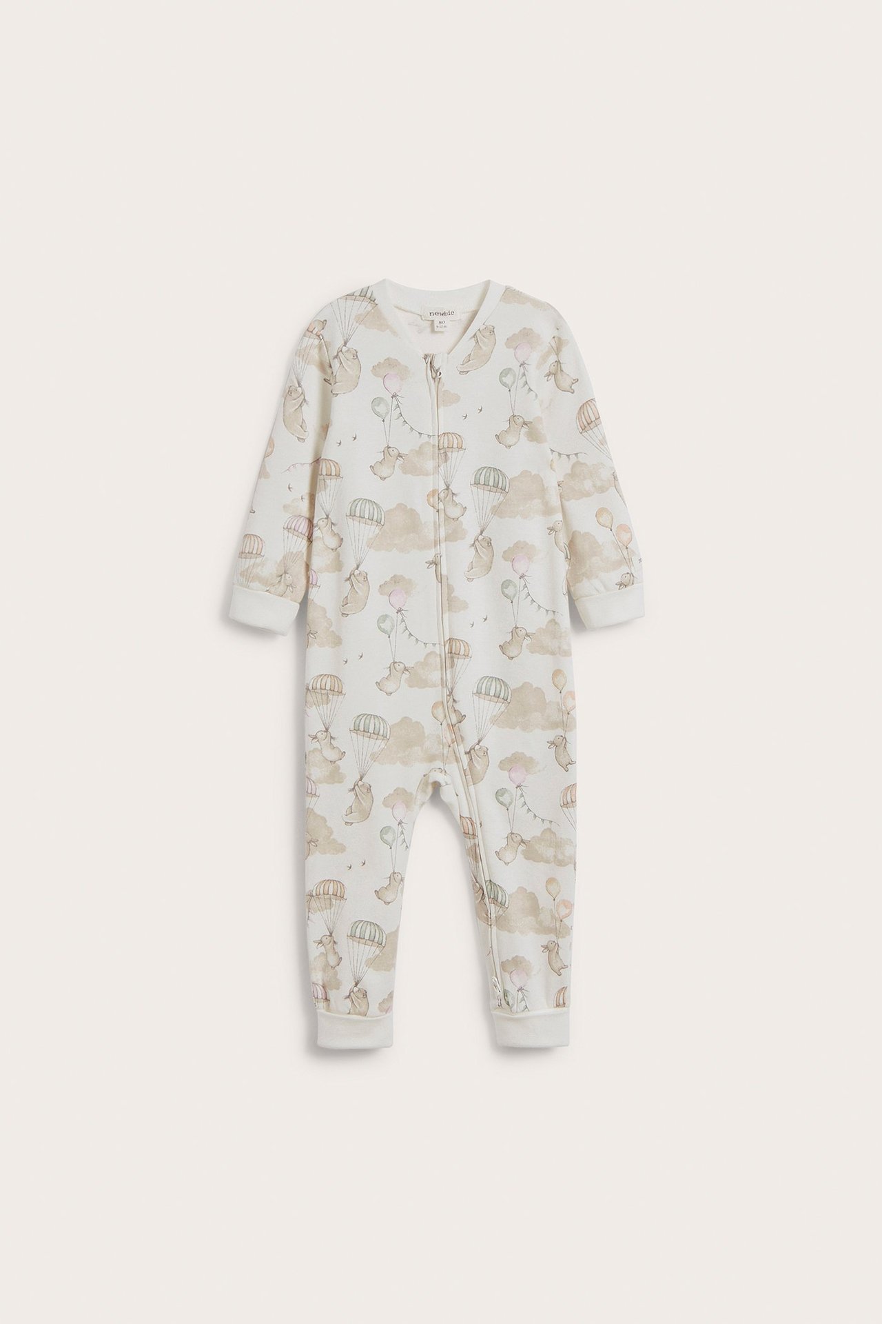 Front view: Off-white baby romper with brown animal and cloud pattern, featuring a two-way zip.