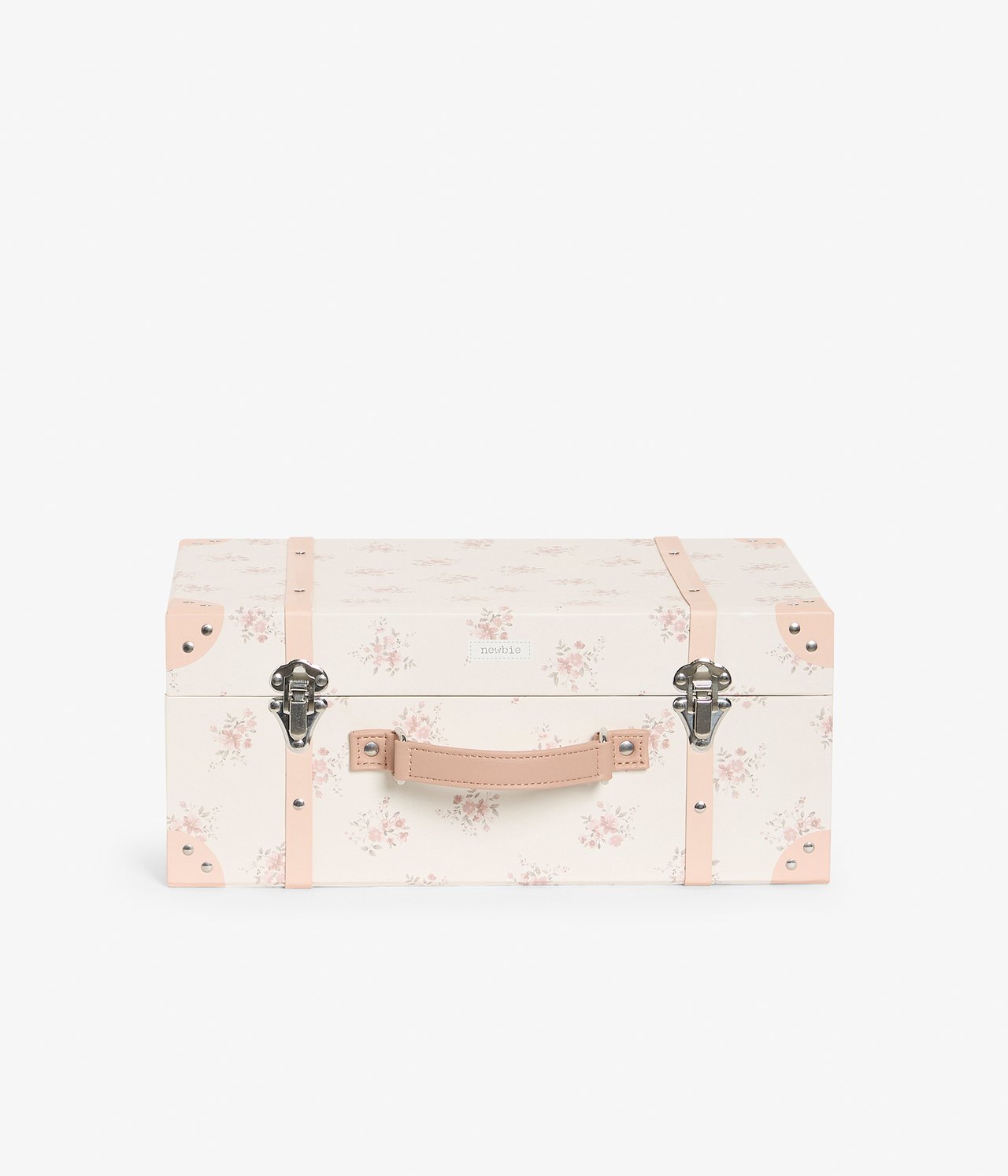 Front view of a white floral print hard paper storage trunk with pink handle and silver buckles.