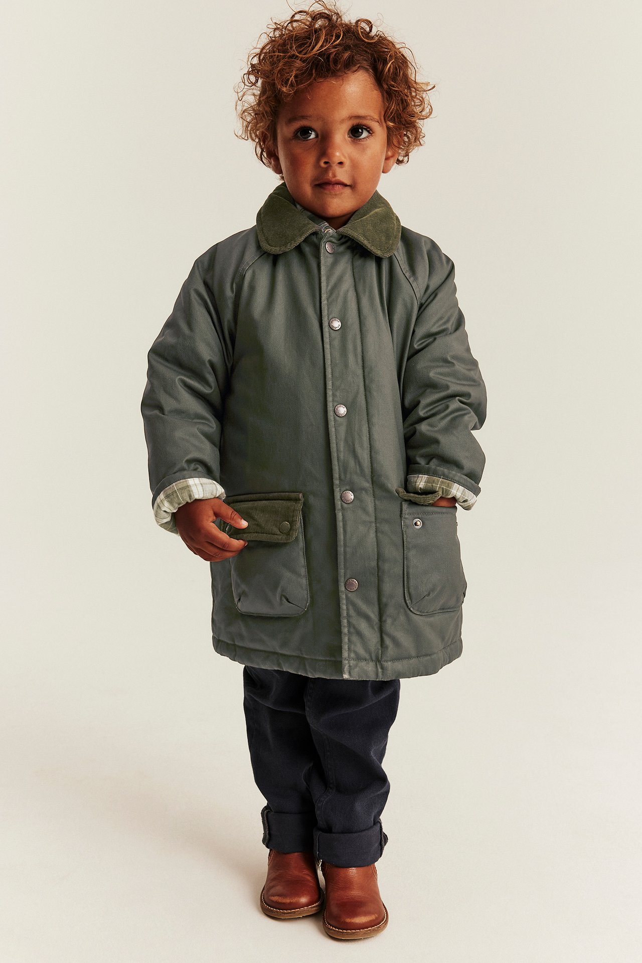 Waxed jacket with collar.