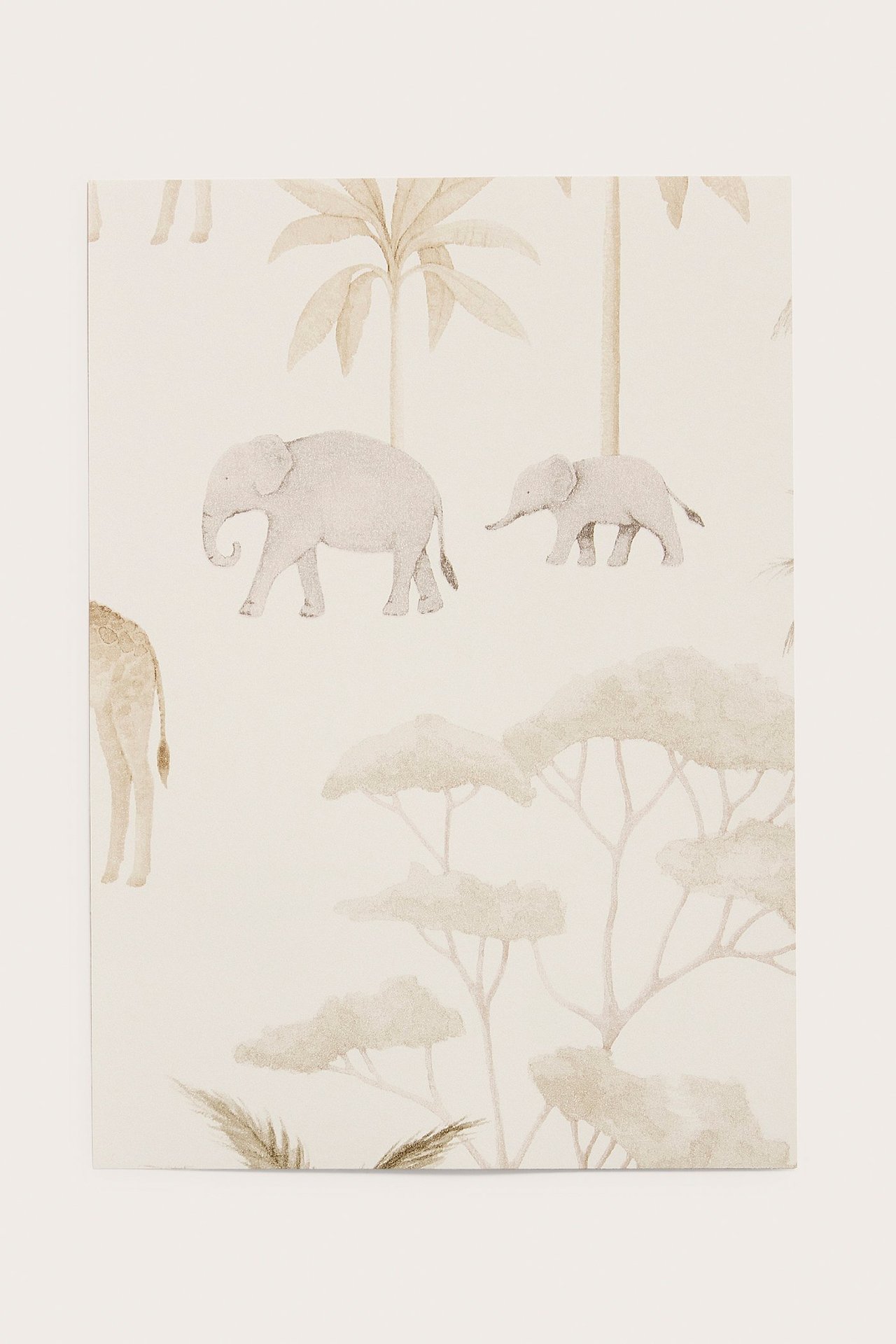 Front view of a beige non-woven wallpaper sample with a savannah animal pattern, featuring elephants and trees.