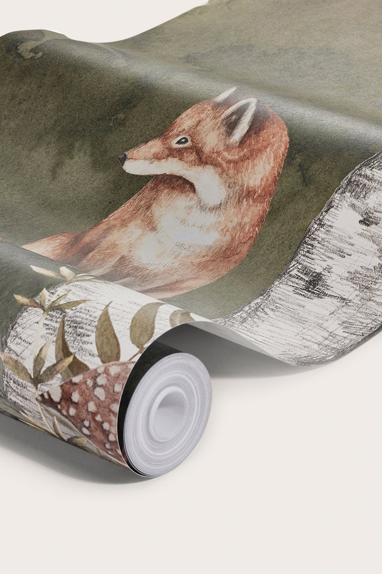 Close-up of a green non-woven wallpaper mural roll with a forest animal pattern, depicting a fox and fawn.