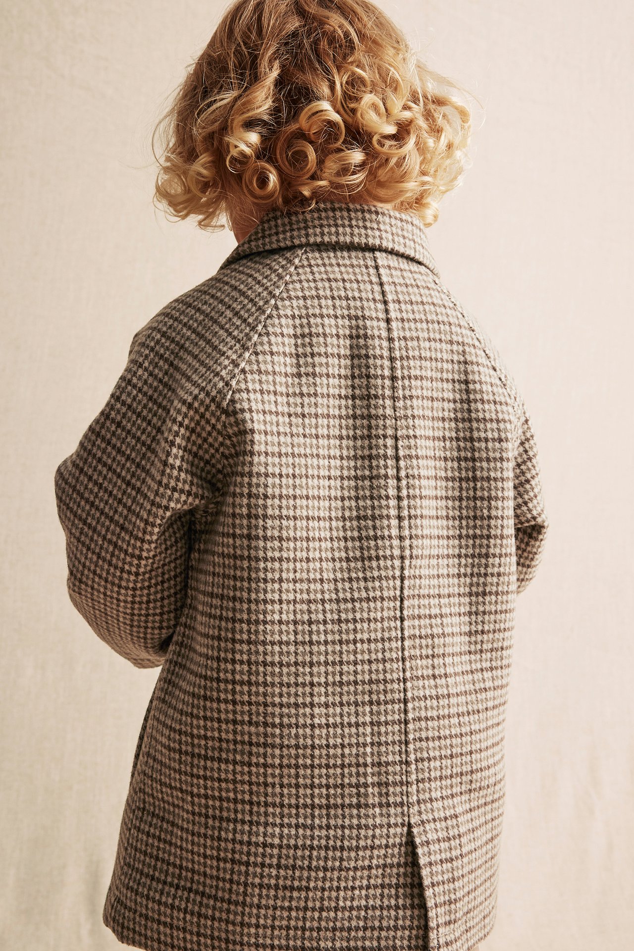 Houndstooth patterned car coat