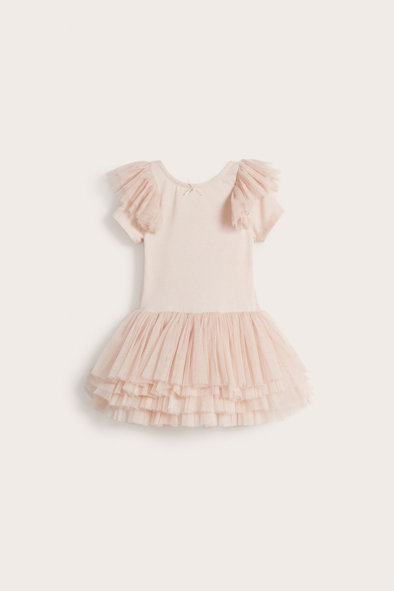 Front view: light pink kid's ballerina dress with mesh ruffle sleeves, small bow, and layered mesh skirt.