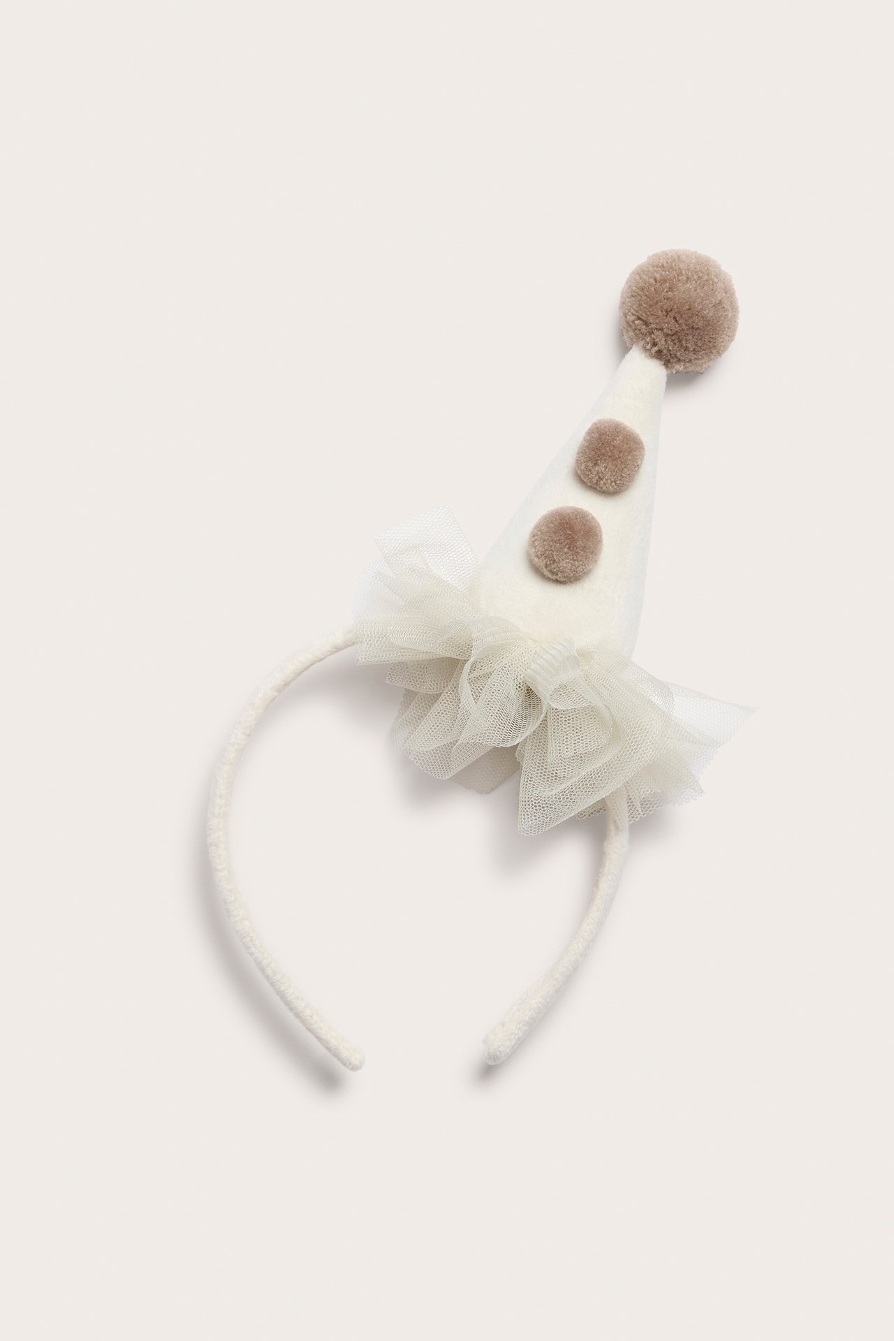 Pearl-colored headband with clown hat