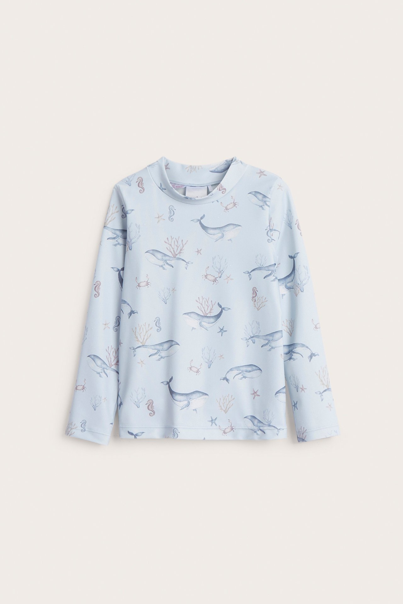 Front view of a kid's light blue long-sleeved UV top with a sea creature pattern.