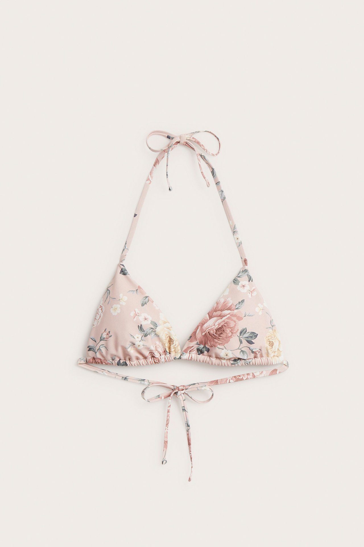 Front view of a pink floral triangle bikini top with tie fastenings at the neck and back.