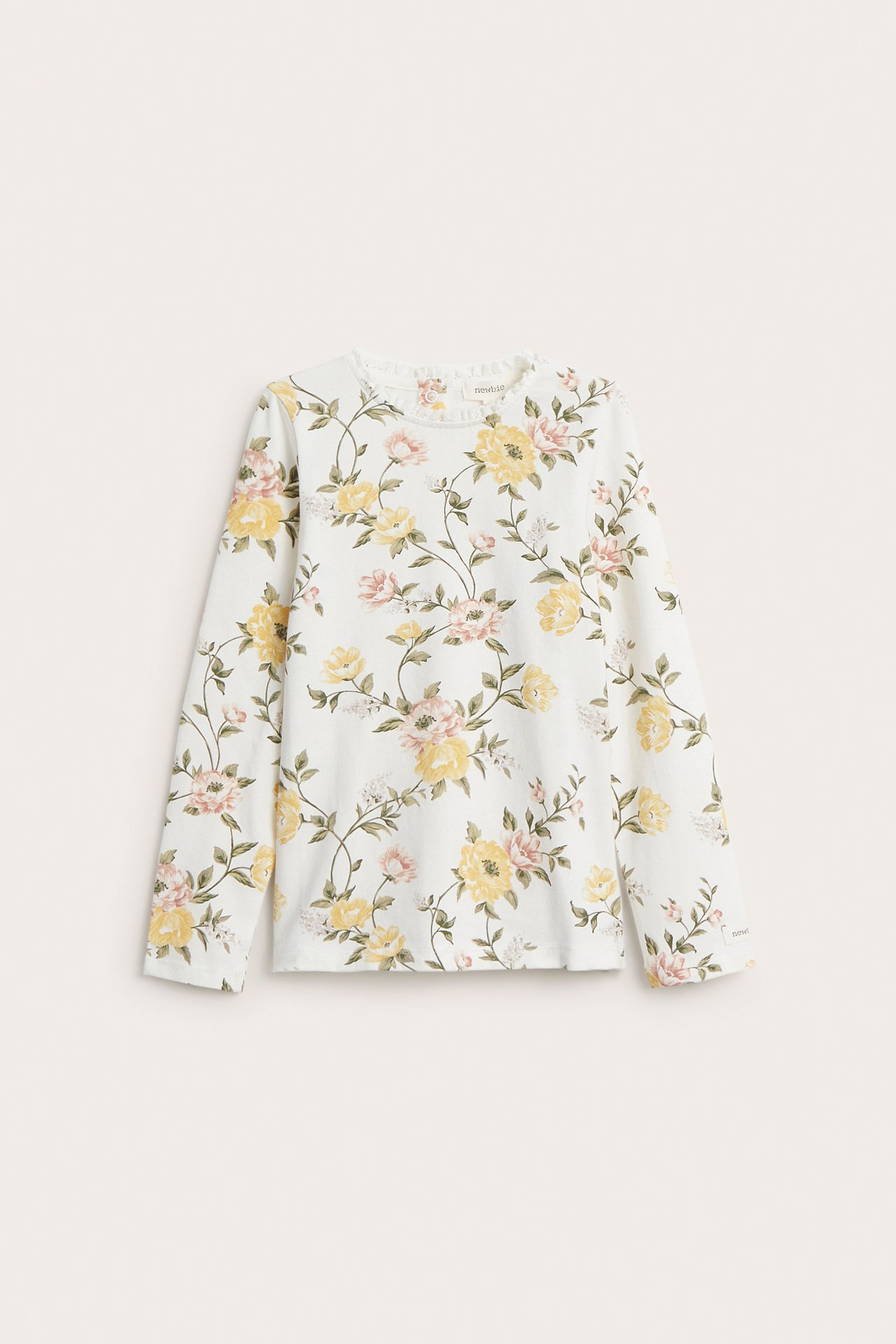 Front view: Off-white long-sleeve jersey top with yellow and pink floral pattern, small lace neck trim.