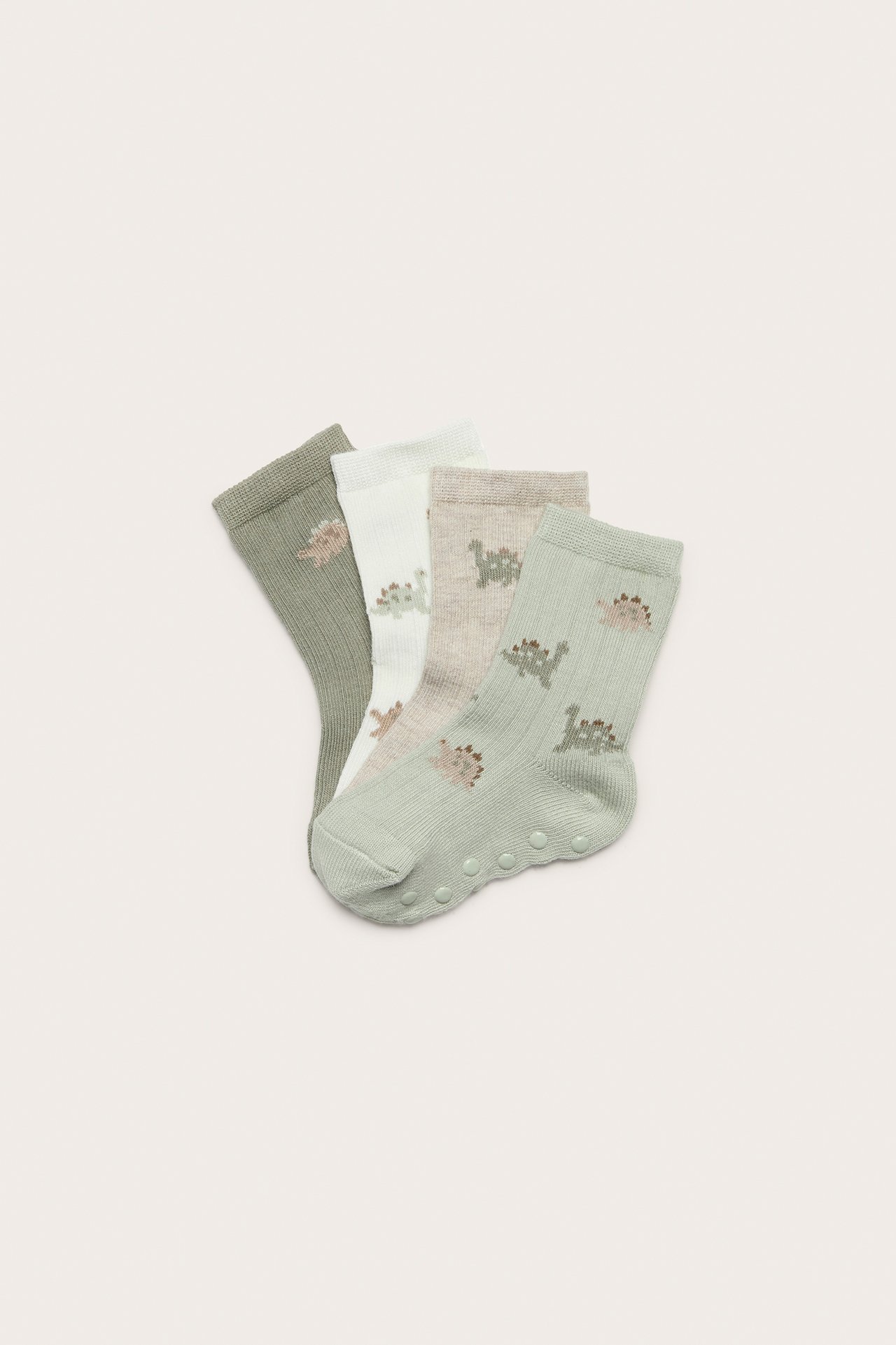 Four pairs of baby socks: mint green, beige, off-white, olive, with dinosaur patterns and anti-slip.