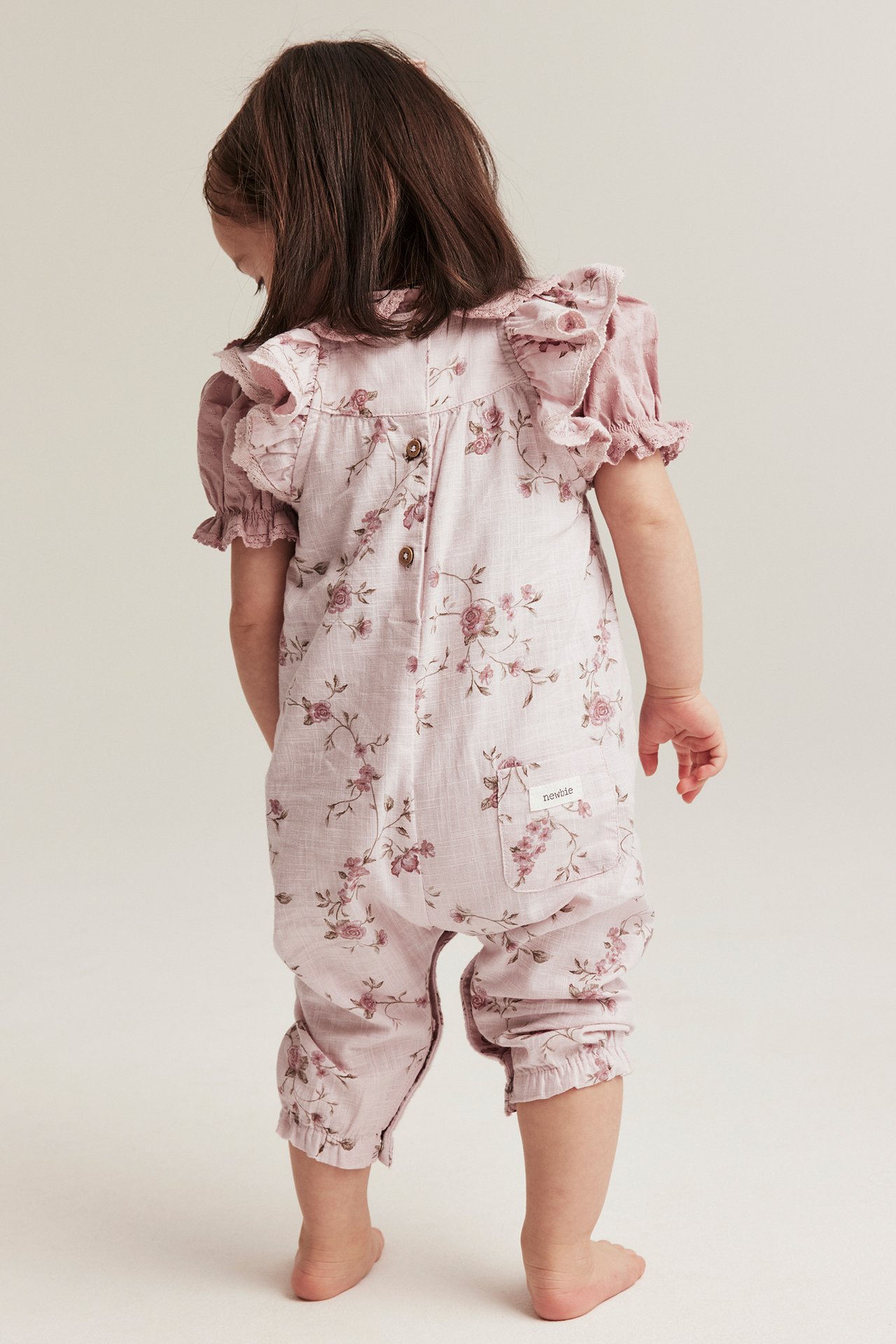 Geblümter Jumpsuit mit Rüschen - Rosa - 1