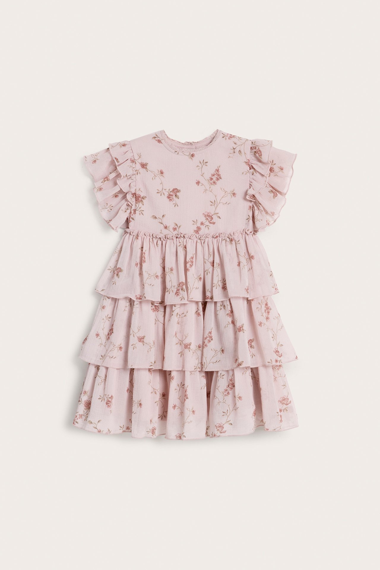 Front view of a kid's pink floral chiffon dress with ruffled sleeves, lace at neck, and tiered skirt.