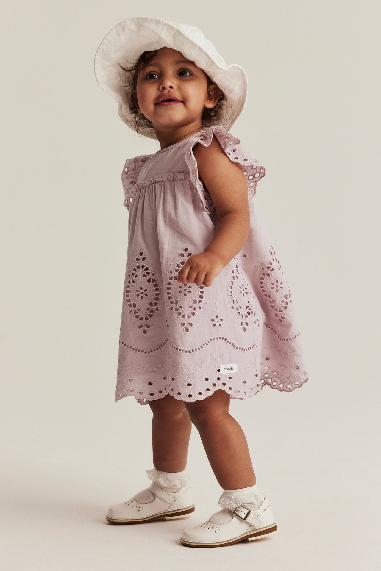 Embroidered dress with frill