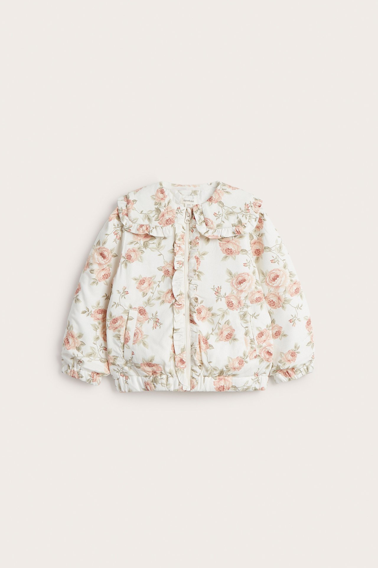 Front view of an off-white kid's floral bomber jacket with pink roses, ruffled collar, and zipper.