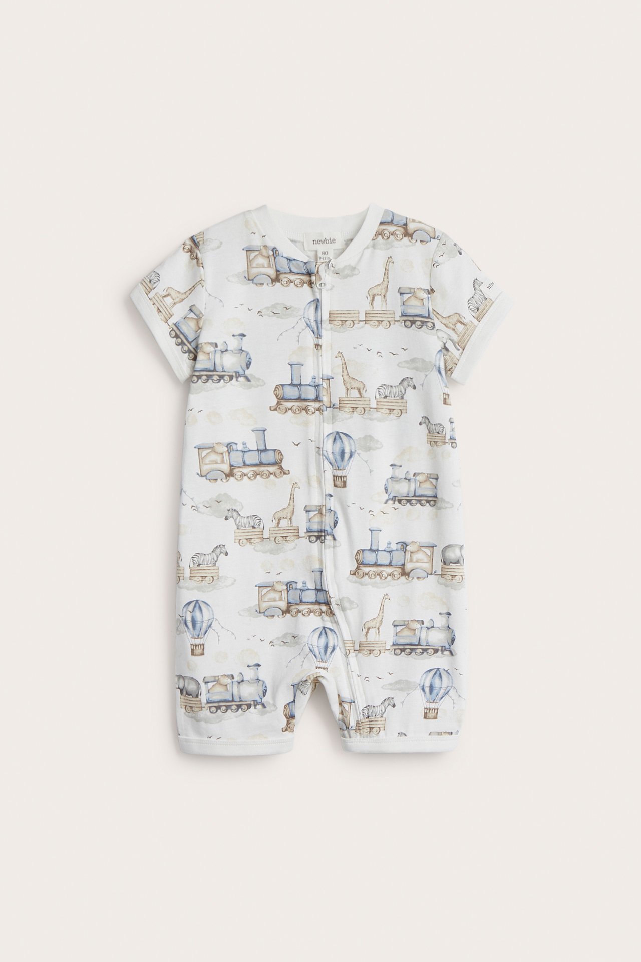 Front view: Offwhite baby romper in soft cotton jersey with vehicle and animal pattern, zip.