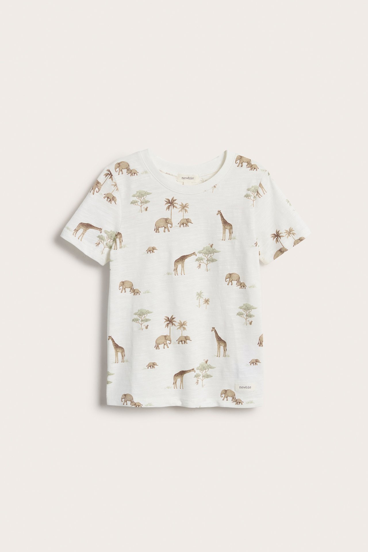 Front view: Off-white kid's short-sleeved t-shirt in slub jersey with ribbed neck and animal print.