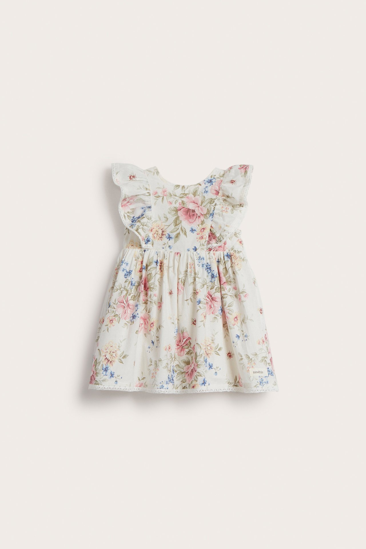 Front view of an off-white kid's floral dress with ruffled sleeves and lace trim.