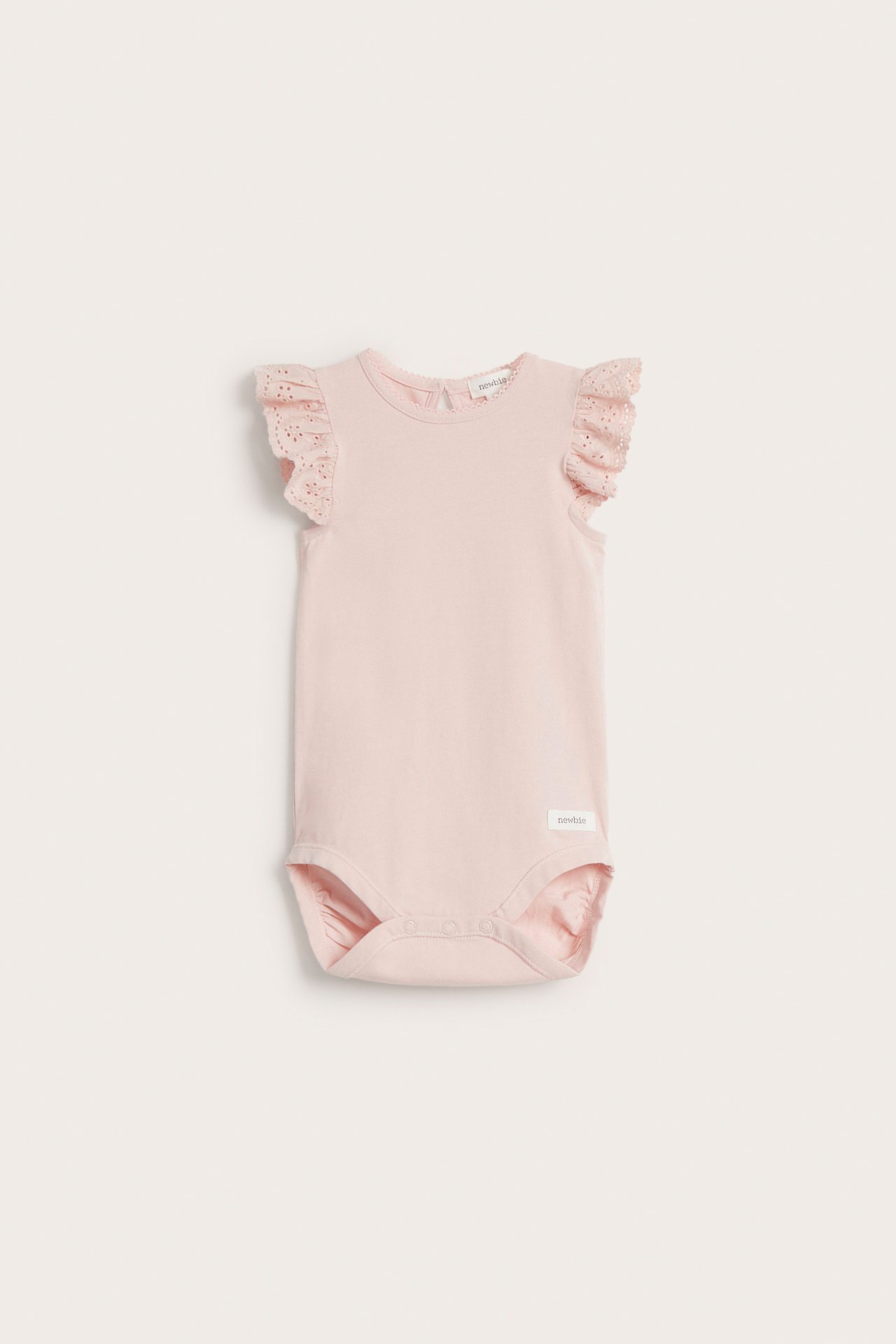 Front view of a light pink baby bodysuit with short, ruffled cotton lace sleeves and back button closure.