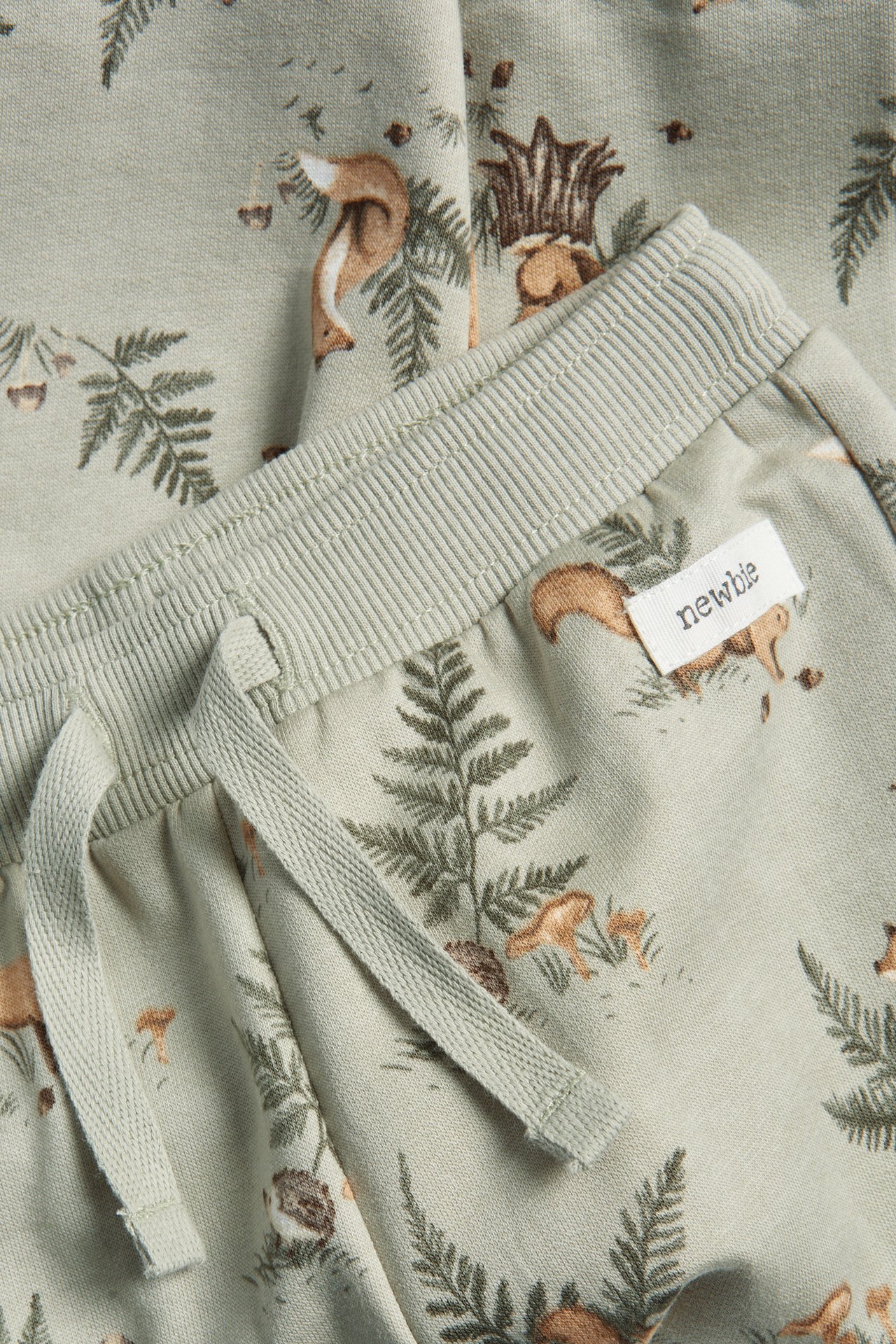 Joggers with forest motif