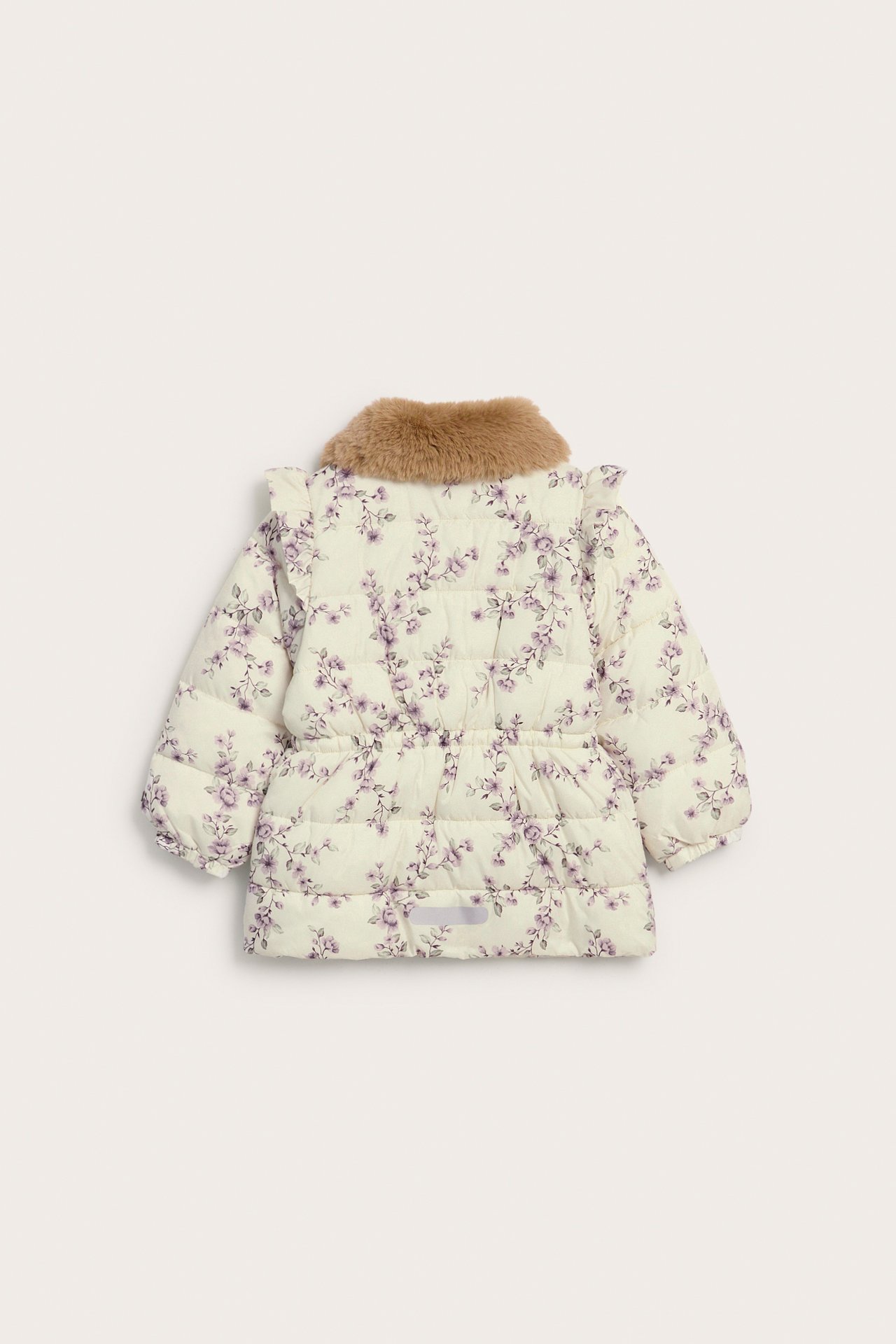 Back view of a kid's light beige floral padded jacket with brown faux fur collar and shoulder ruffles.