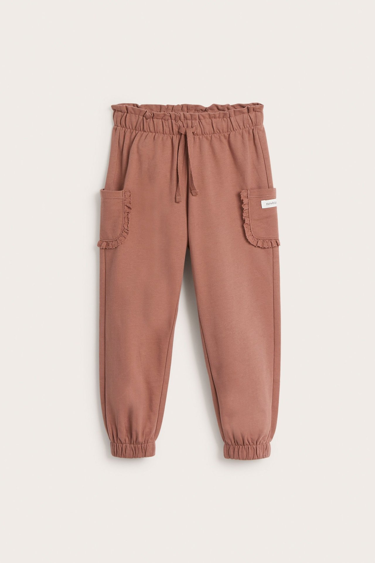 Trousers with pockets and lace