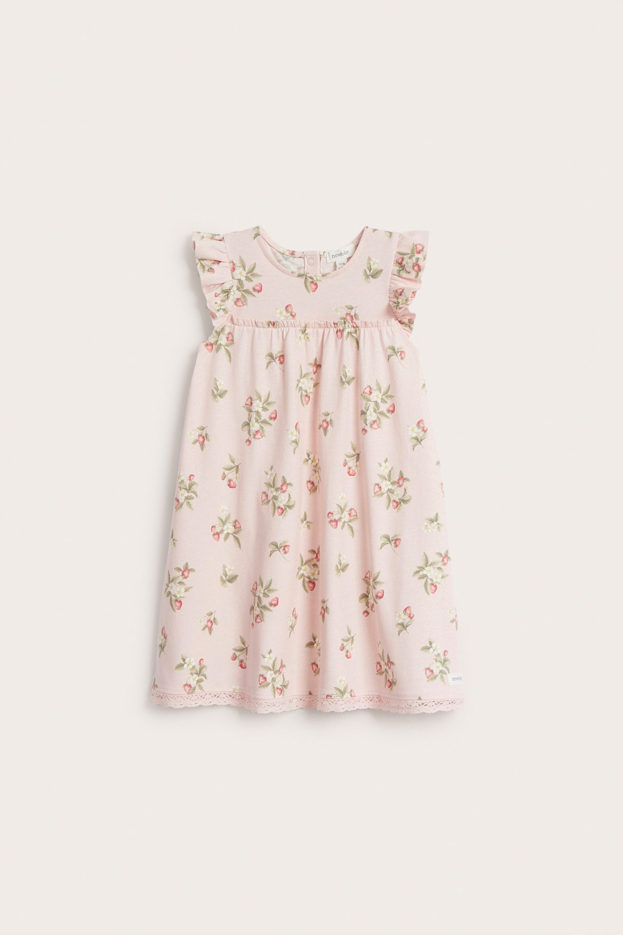 Front view of a light pink baby's jersey dress with ruffled sleeves, strawberry and floral print, and lace trim.