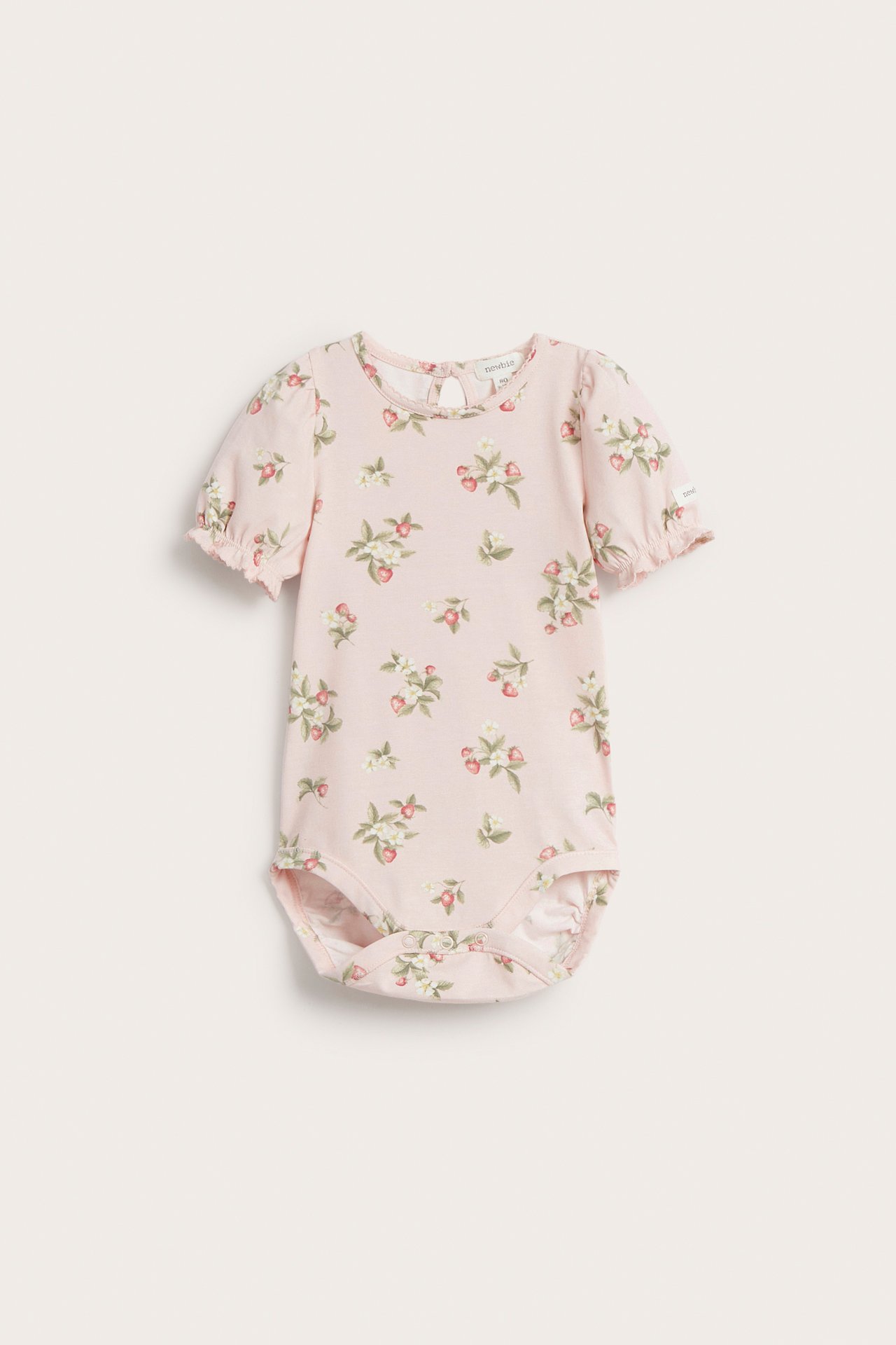 Front view of a light pink baby short-sleeved bodysuit with a strawberry floral pattern and puffed sleeves.