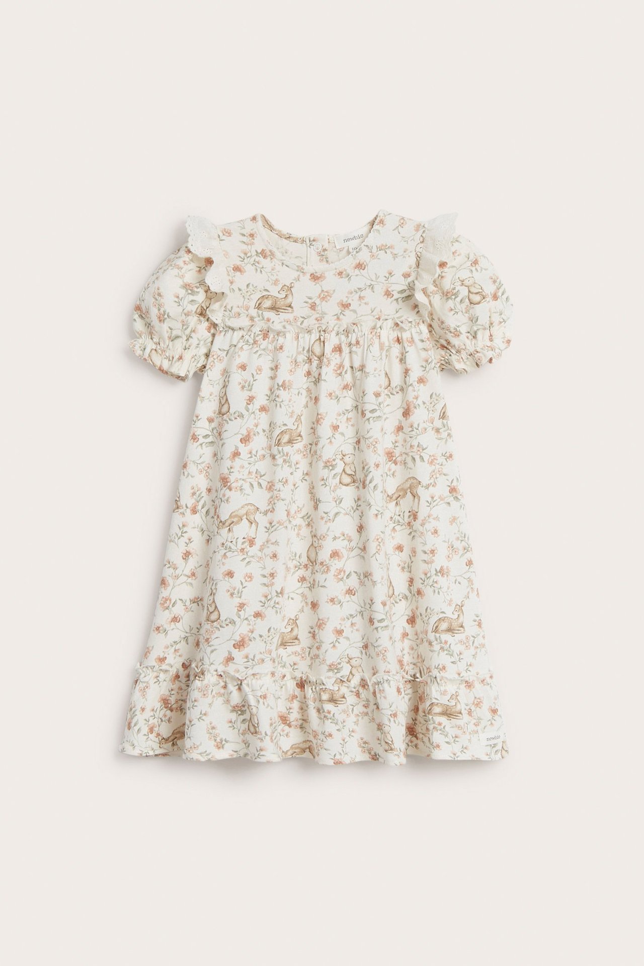 Front view: Off-white cotton dress with short puff sleeves, lace ruffles, and floral deer pattern.