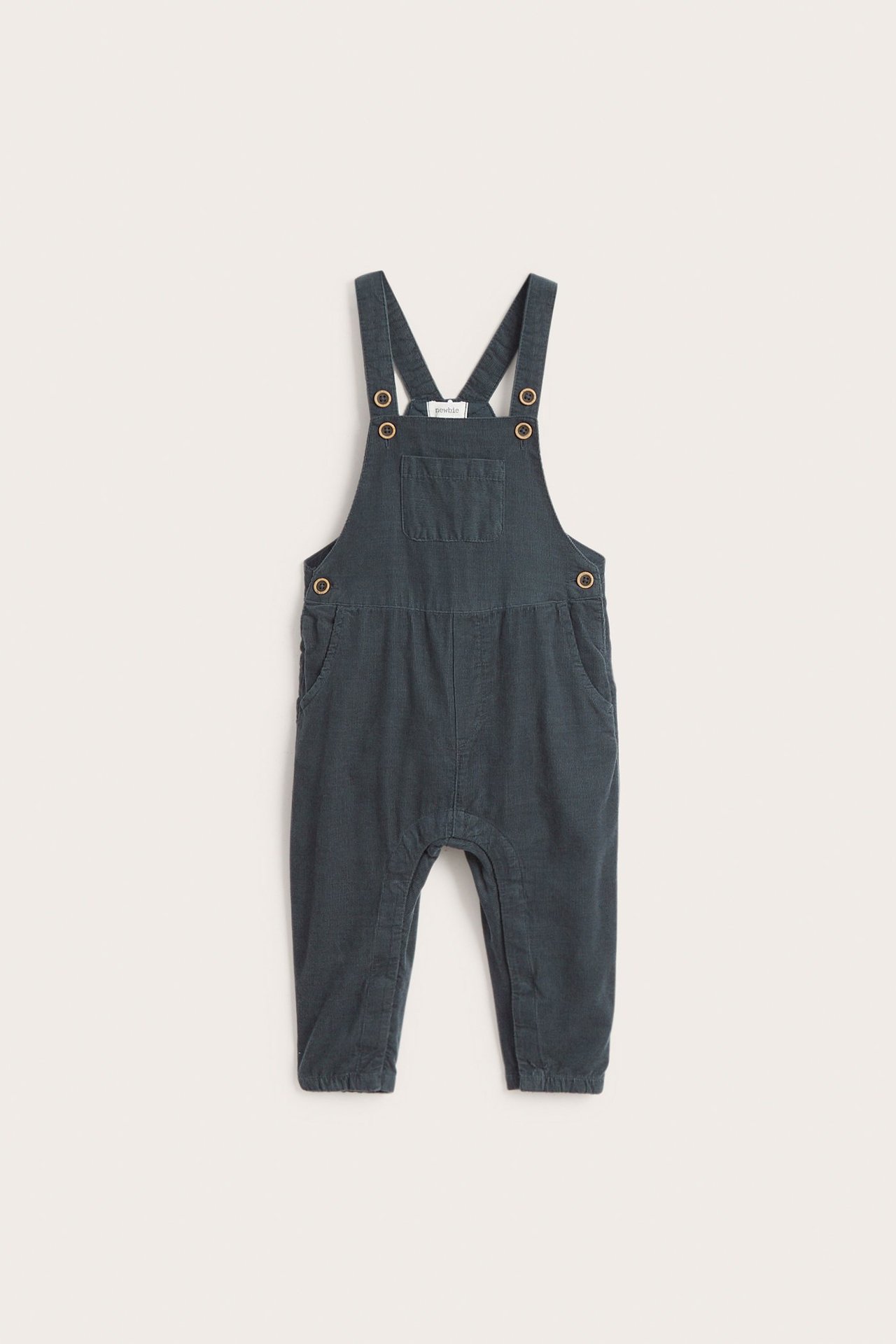 Dark blue Manchester bib pants with adjustable straps, chest pocket, side and back pockets.