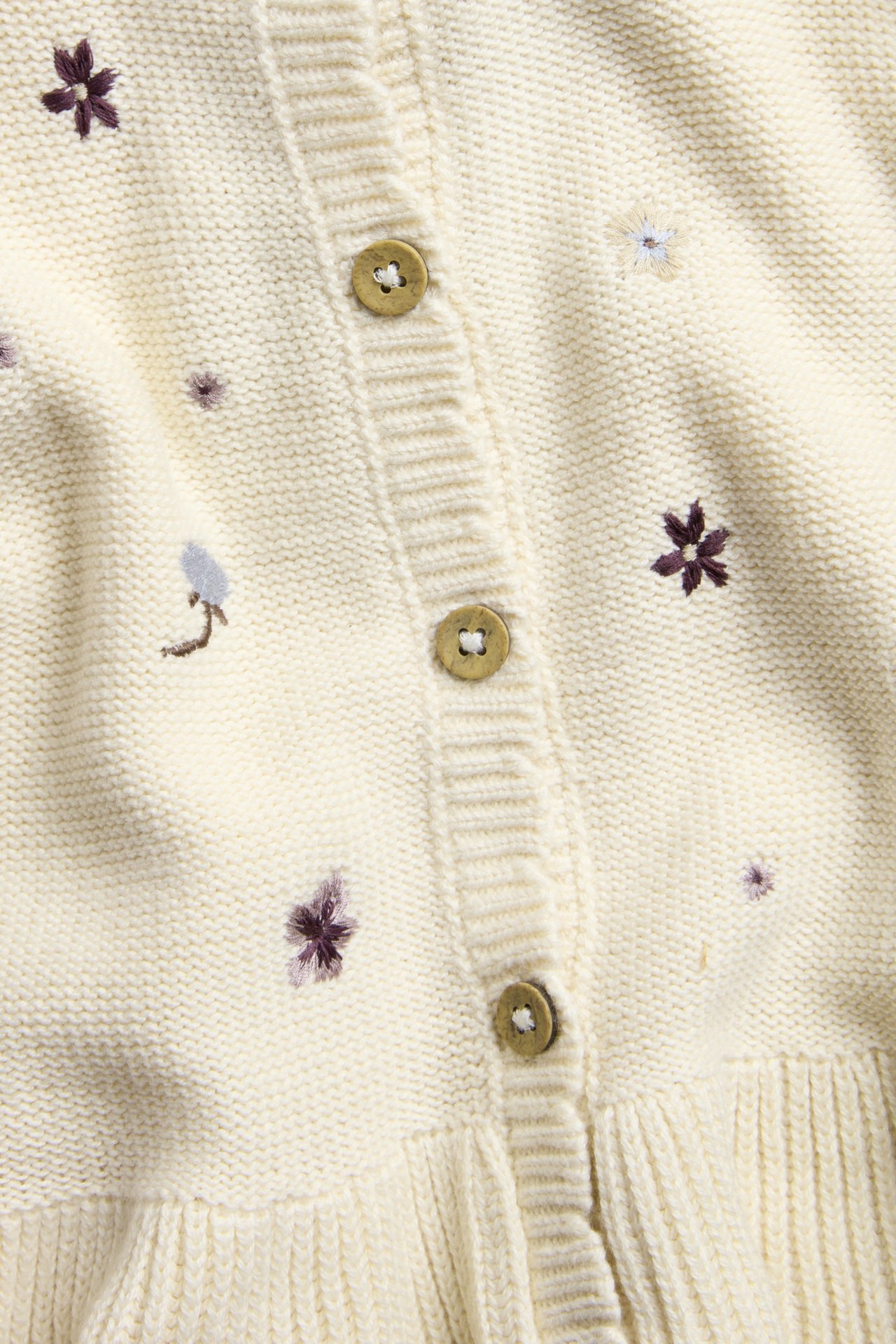 Knitted cardigan with embroidery