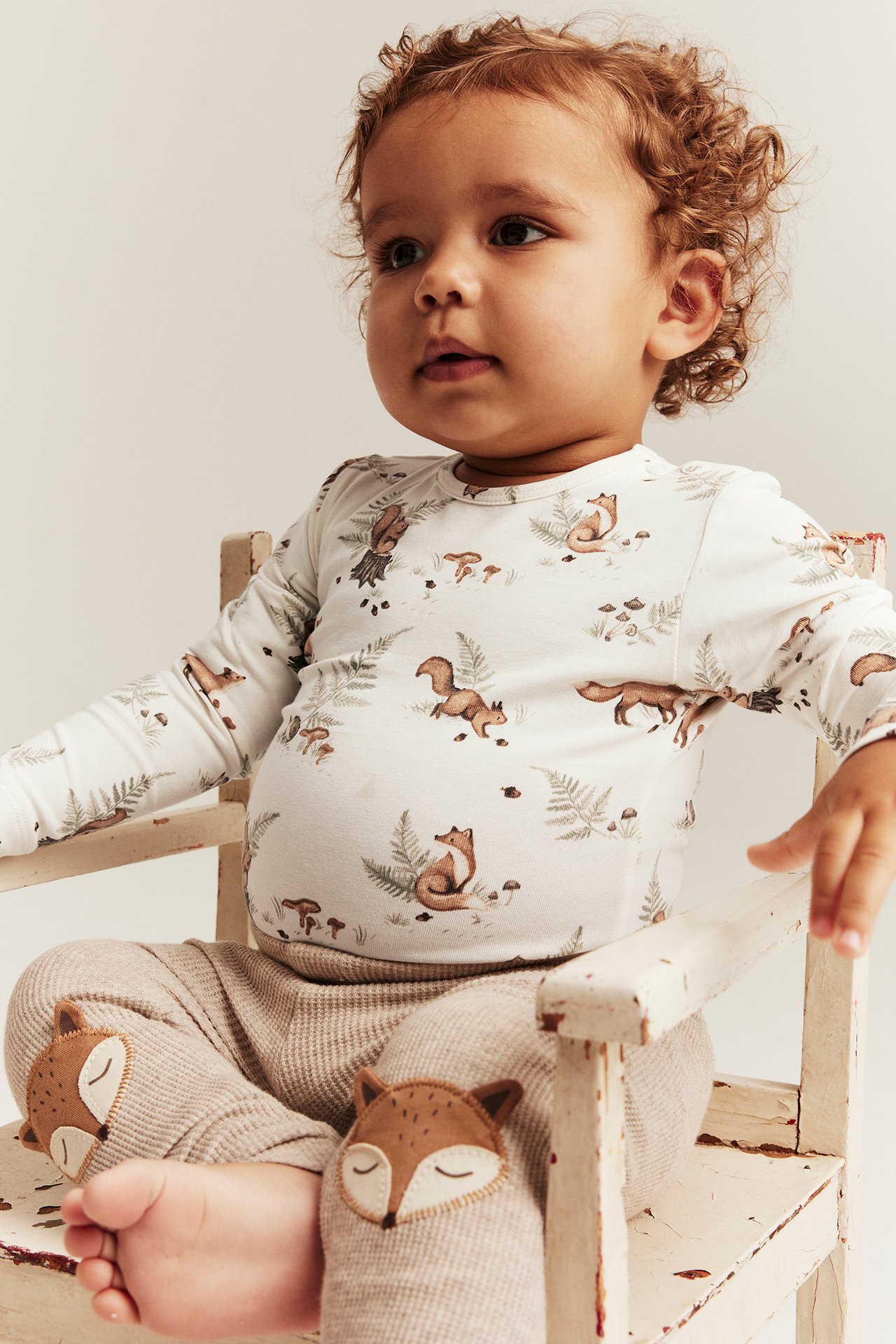 Long sleeve bodysuit with forest motif