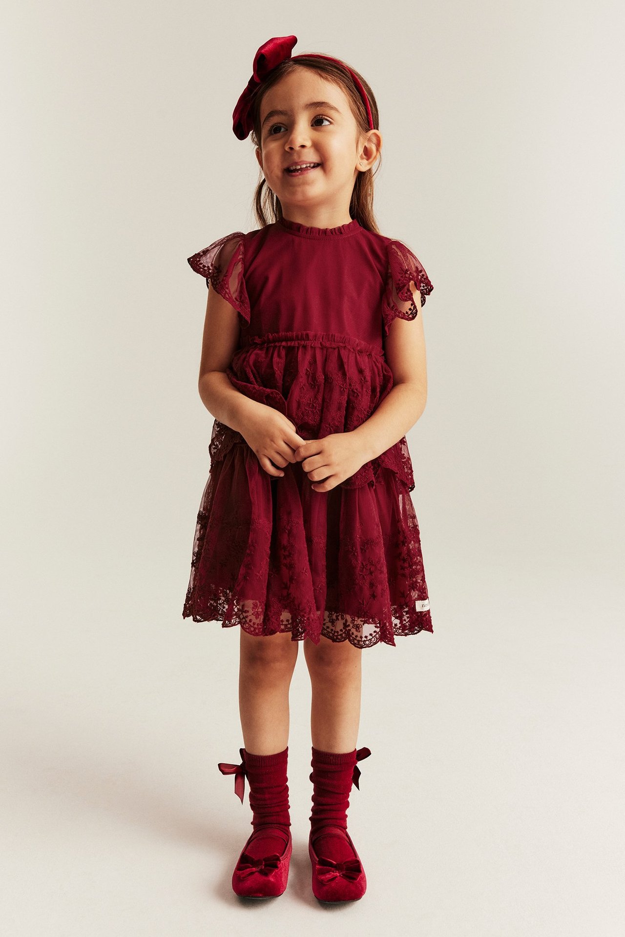 Red mesh dress with embroidery for kids, sleeveless with layered skirt.