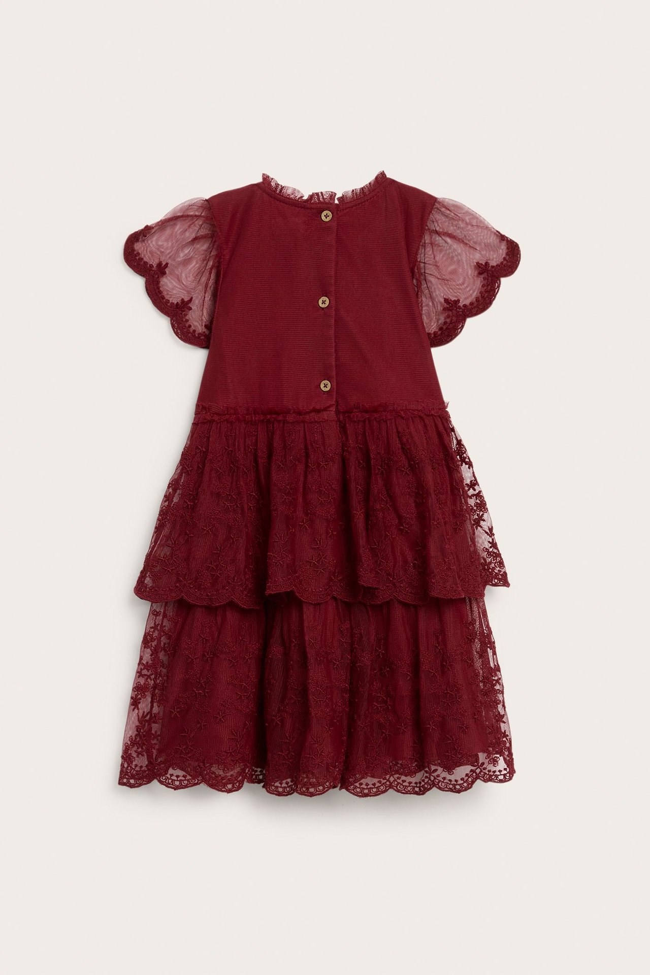 Red kid's mesh dress with ruffled neckline, double butterfly sleeves, and embroidered tiered skirt.
